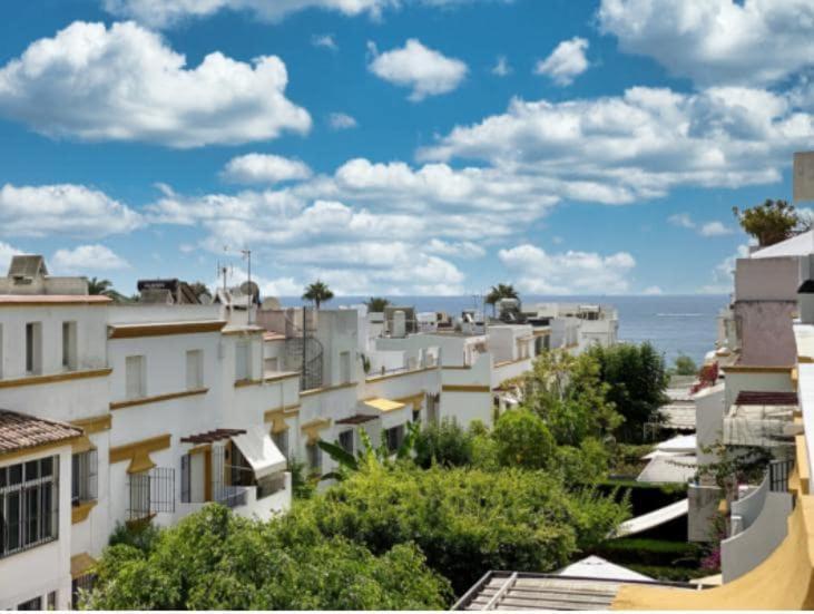 A Bright Townhouse In The Marbellamar Residential Development Marbella